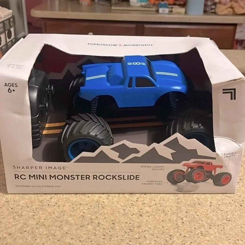 Brand New Sharper Image Remote Control Mini Monster Truck Rockslide Blue Toy
